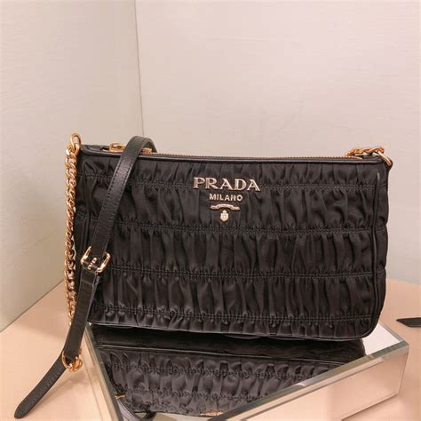 prada bandolier bag|prada bag with small pouch.